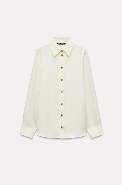 Flowing shirt with gold buttons
