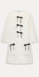 Short knit dress with bows