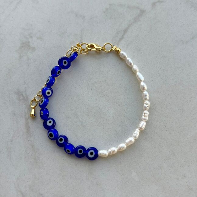 Asymmetric bracelet evil eye