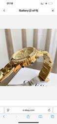 Guess women’s confetti gold dial watch