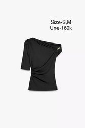 Asymmetric polyamide top