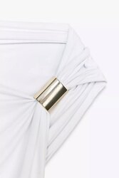 Asymmetric polyamide top