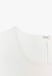 Knit peplum top with ties