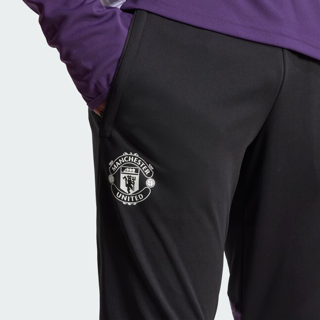MUFC TR PNT BLACK/AURPLU/BLACK
