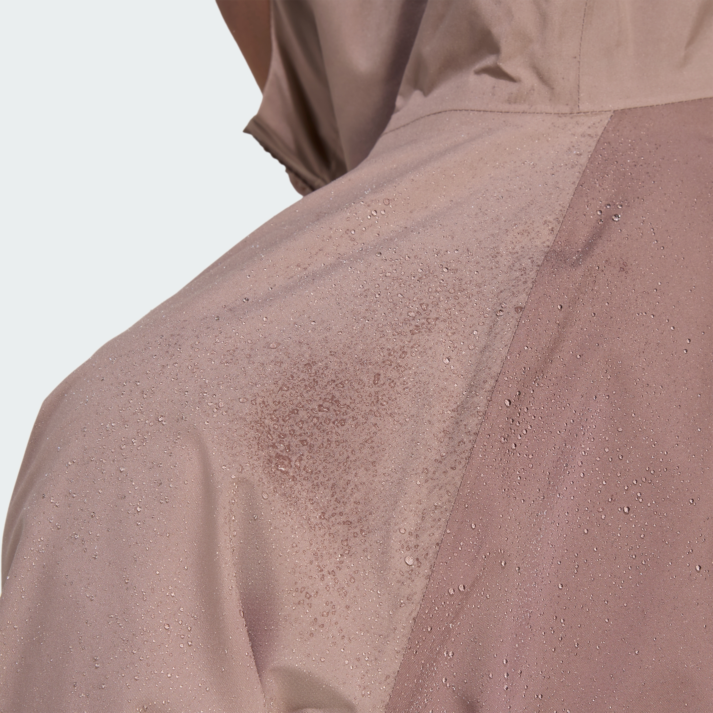 W MT 2L RAIN JK EARSTR/TRABRN