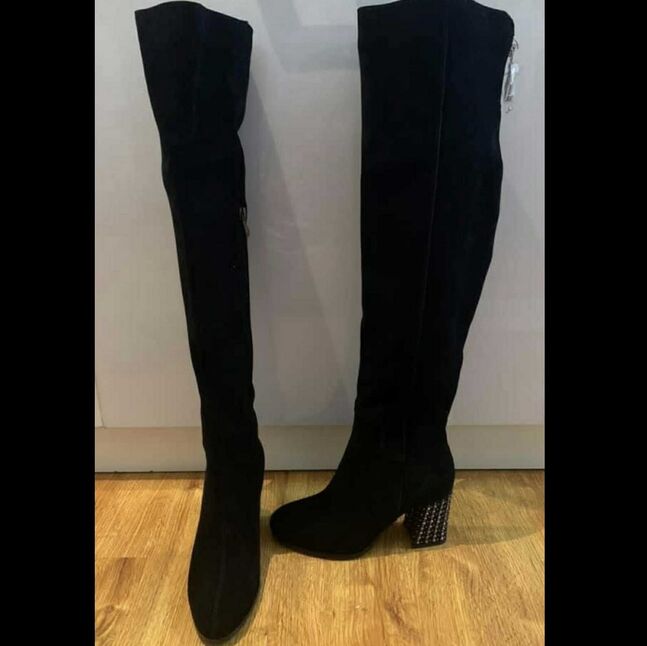 Өвдөг давсан өвлийн гутал