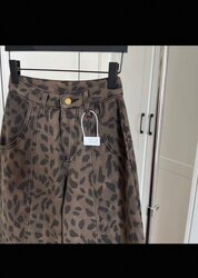 Дотортой жинс