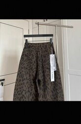 Дотортой жинс