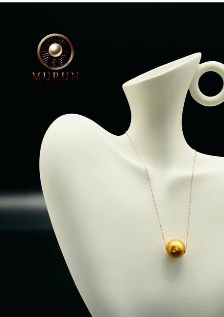 Алтан сувдан зүүлт