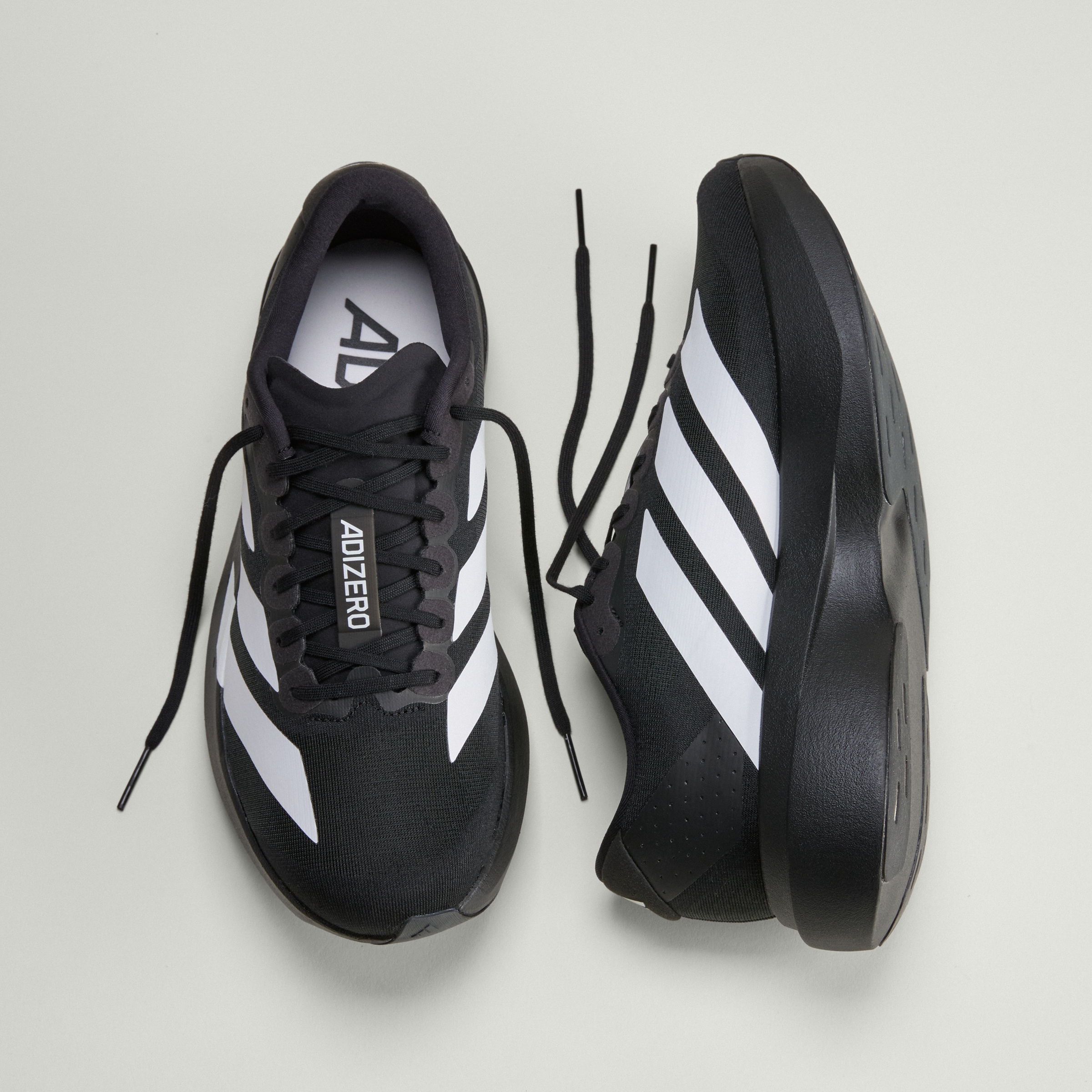 adizero Evo SL M CBLACK/FTWWHT/CBLACK