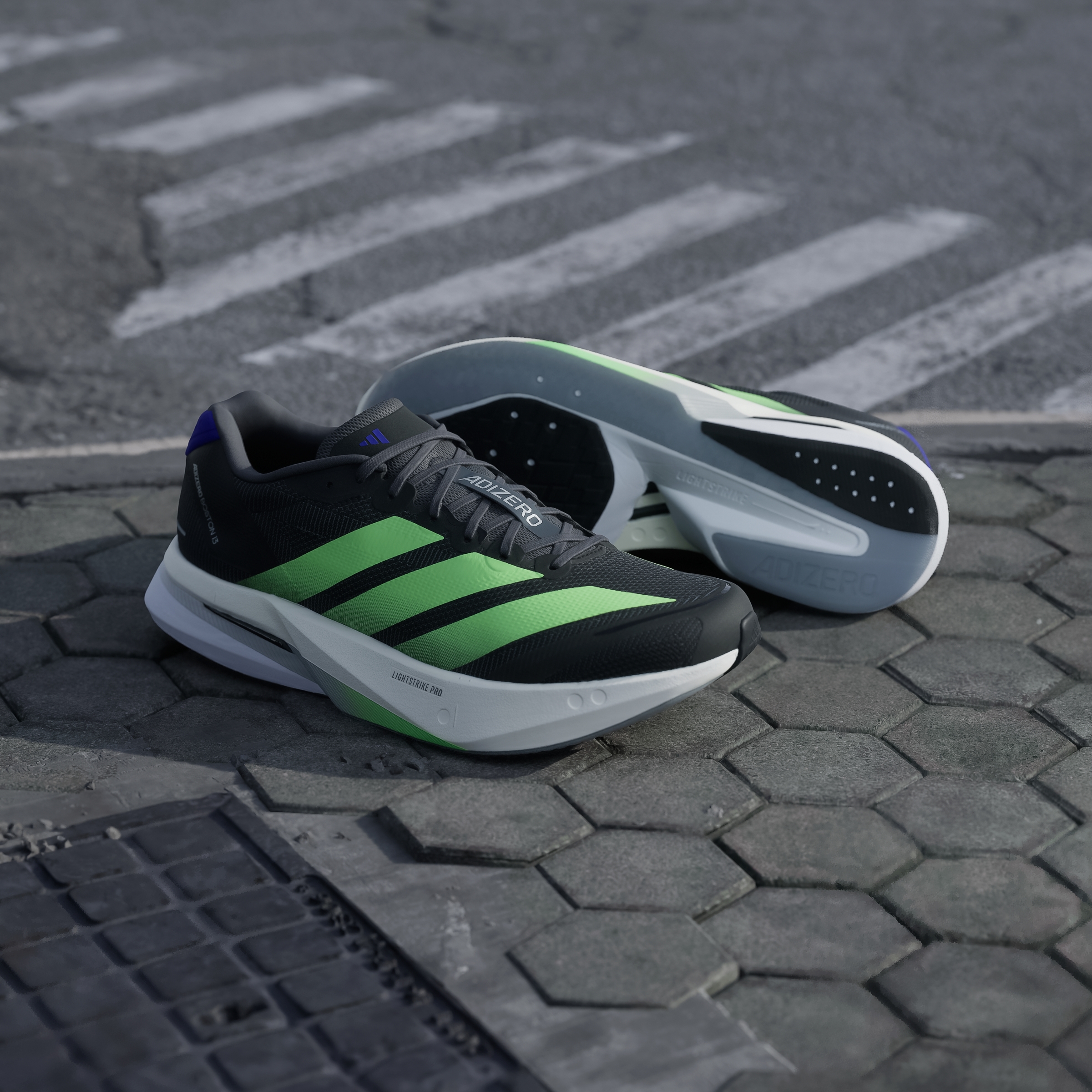 ADIZERO BOSTON 13 M CBLACK/LIMBUR/ENEINK