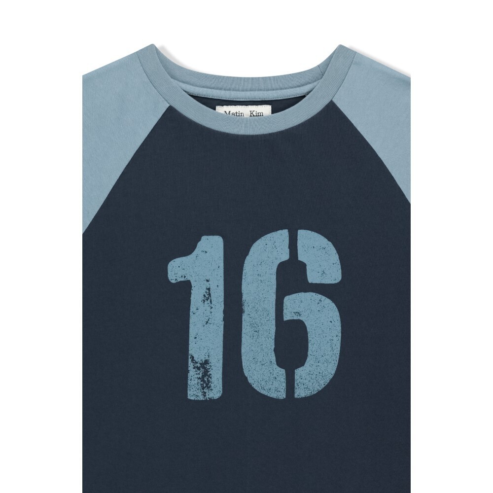 RAW EDGE RAGLAN TOP