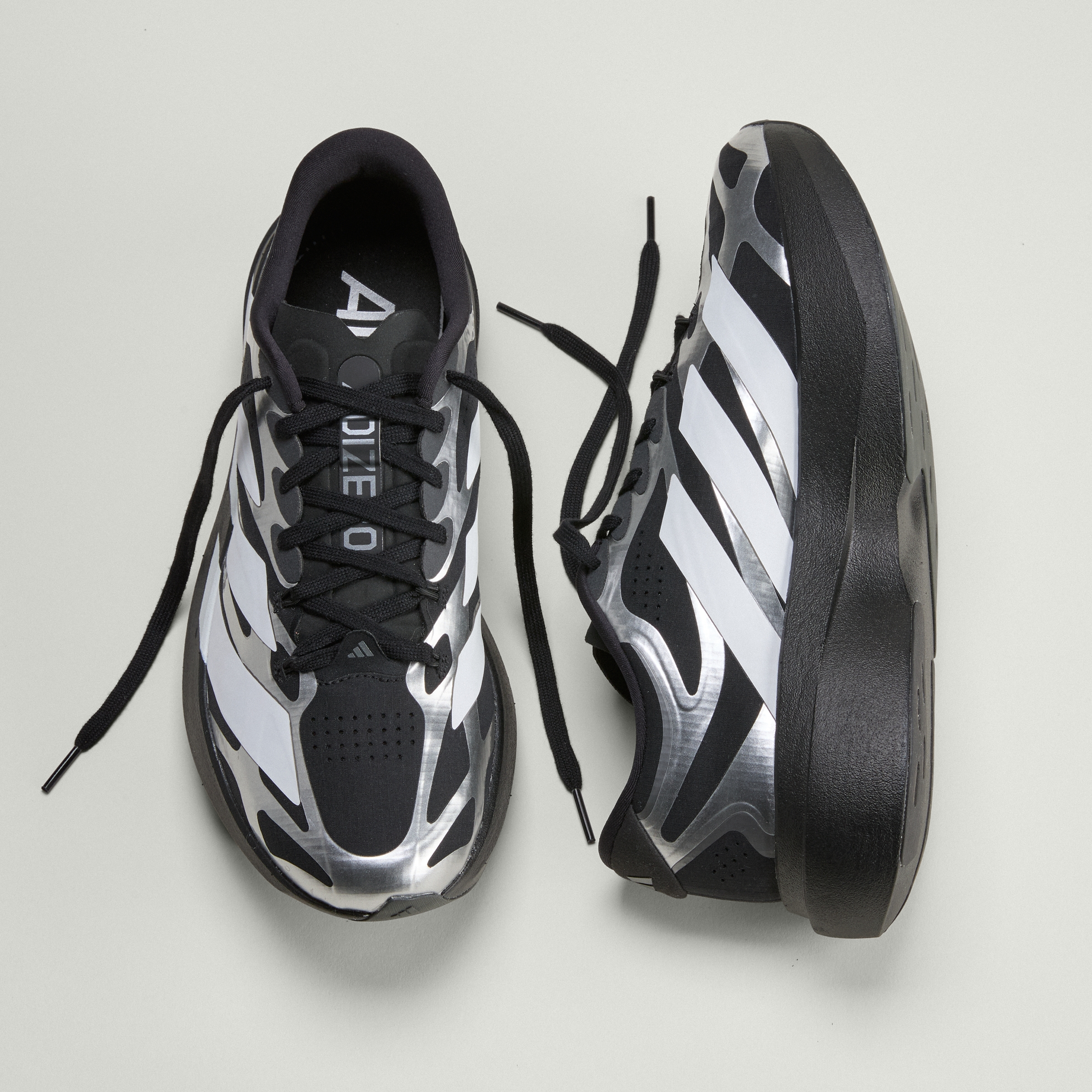 ADIZERO EVO SL EXO CBLACK/FTWWHT/IRONMT