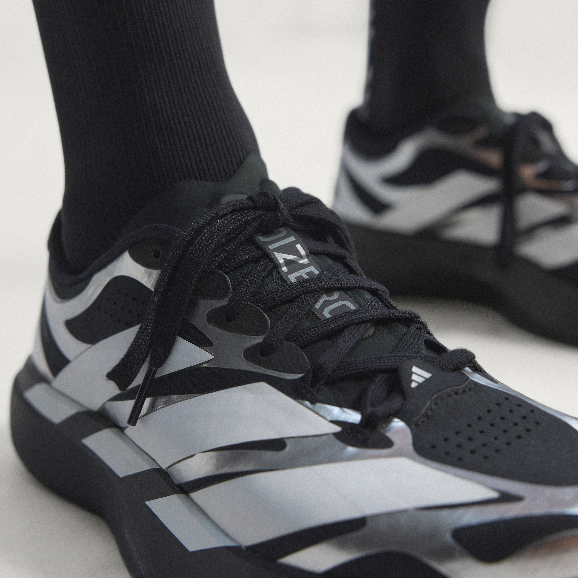 ADIZERO EVO SL EXO CBLACK/FTWWHT/IRONMT