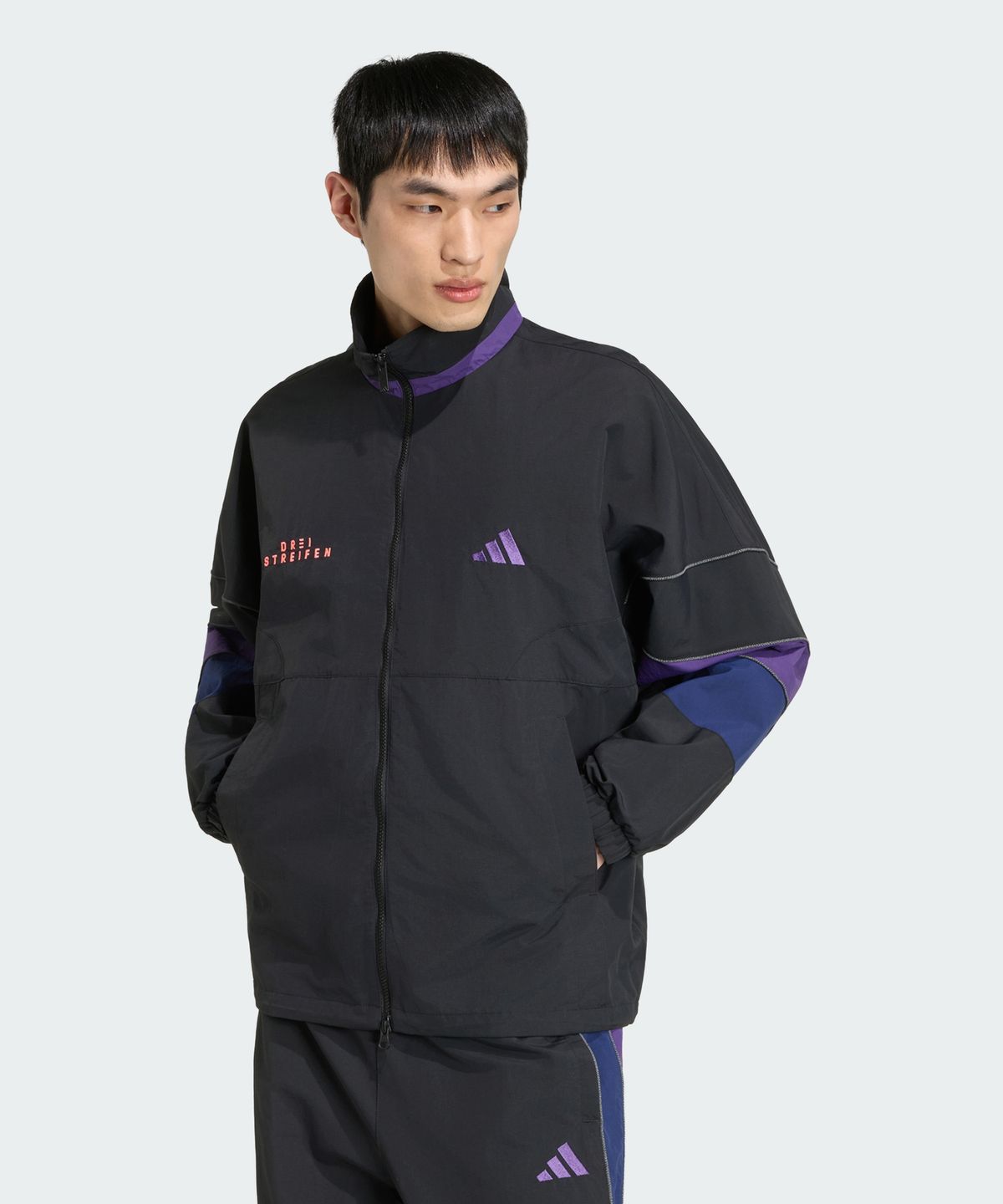 BL WOVEN JKT BLACK/VIOLET