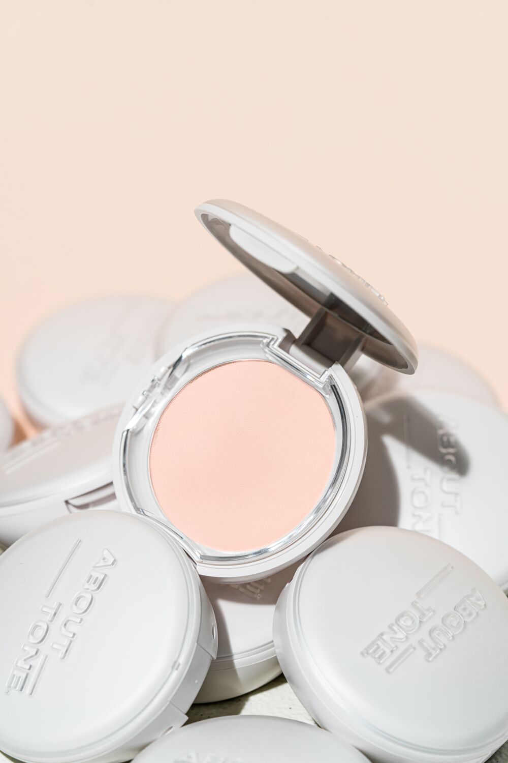 "ABOUT TONE SEBUM CUT POWDER PACT "